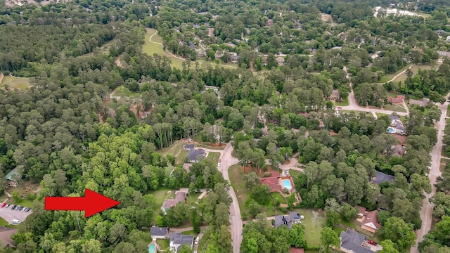 5 Highland Hollow Dr, Conroe, TX 77304 - drone / aerial view of a heavily wooded area