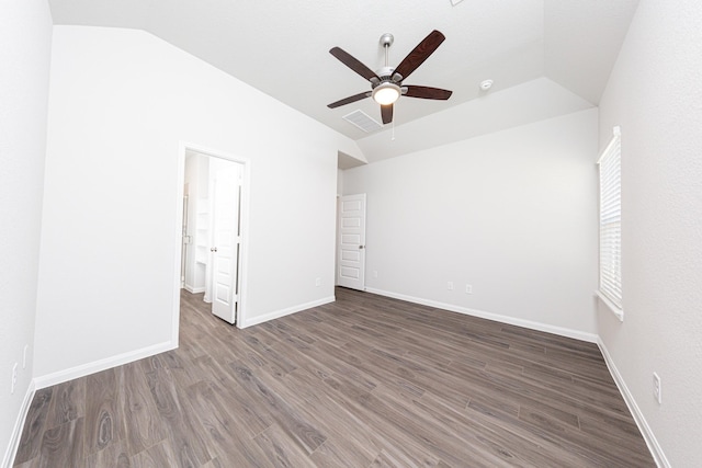 13609 Goldeye Dr, Conroe, TX 77384 - unfurnished bedroom with visible vents, lofted ceiling, and wood finished floors