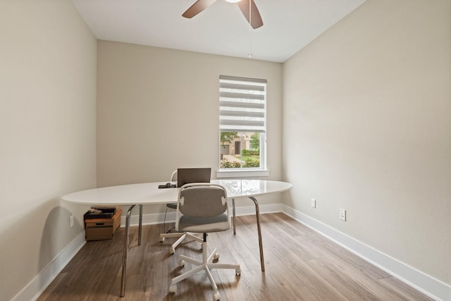 720 Serenity View Ln, Katy, TX 77493 - office area with a ceiling fan, baseboards, and wood finished floors