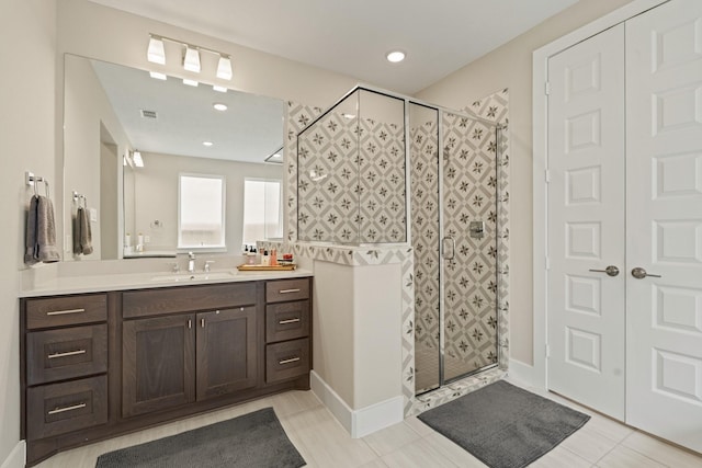 720 Serenity View Ln, Katy, TX 77493 - bathroom with vanity, visible vents, and a shower stall
