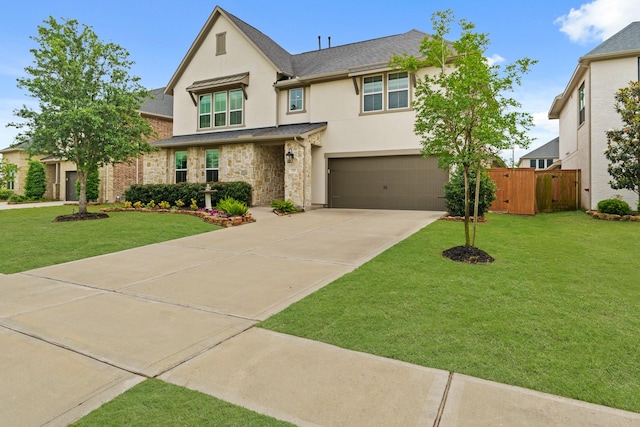 720 Serenity View Ln, Katy, TX 77493 - view of front facade with fence, an attached garage, a front lawn, stucco siding, and concrete driveway