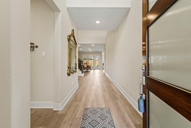720 Serenity View Ln, Katy, TX 77493 - hall with light wood-type flooring, recessed lighting, and baseboards