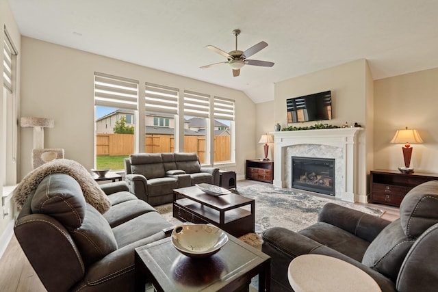 720 Serenity View Ln, Katy, TX 77493 - living room with a ceiling fan and a premium fireplace