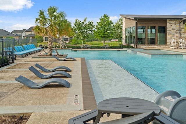 720 Serenity View Ln, Katy, TX 77493 - community pool featuring fence and a patio area