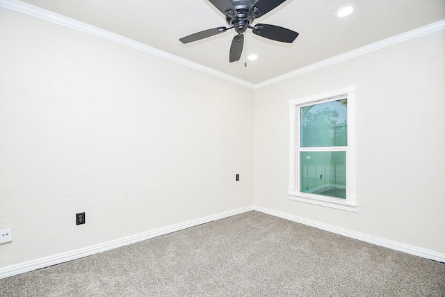 spare room featuring a ceiling fan, crown molding, baseboards, carpet flooring, and recessed lighting