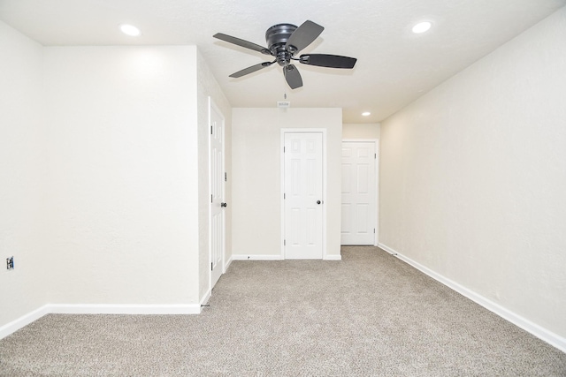 unfurnished bedroom with carpet floors, recessed lighting, and baseboards