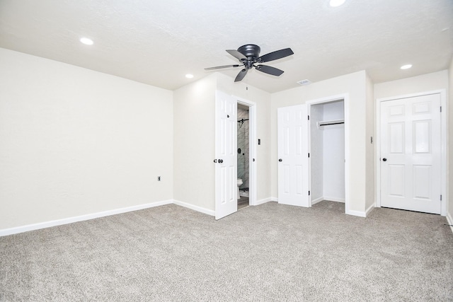 unfurnished bedroom featuring a ceiling fan, visible vents, carpet floors, baseboards, and recessed lighting
