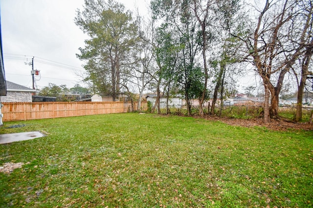 view of yard with fence
