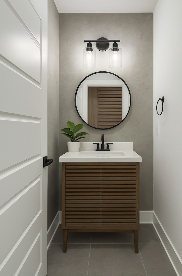 330 Neyland St, Houston, TX 77022 - bathroom with tile patterned floors, baseboards, and vanity