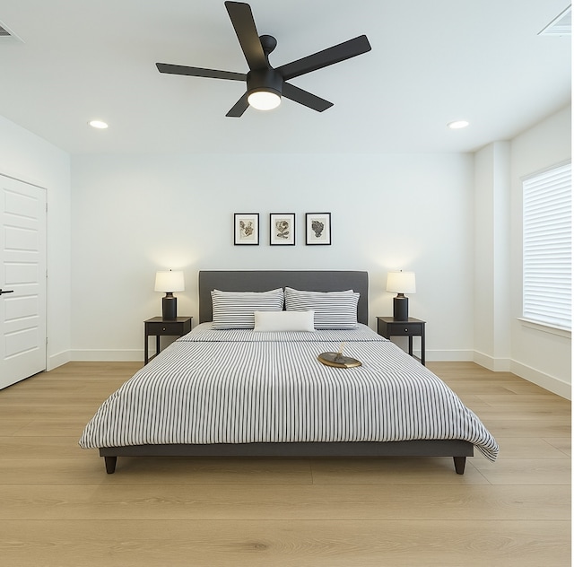 330 Neyland St, Houston, TX 77022 - bedroom with recessed lighting, baseboards, and wood finished floors