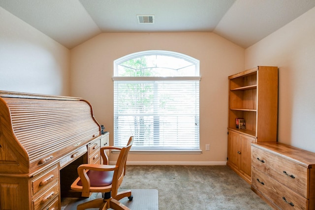 carpeted office with vaulted ceiling and visible vents