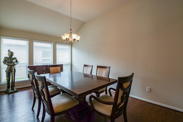 dining area with baseboards, an inviting chandelier, dark wood-style floors, and vaulted ceiling