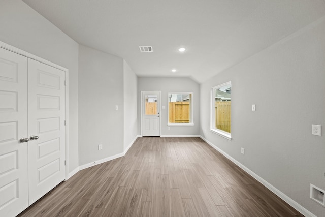 1372 Mount Blanc Path, Conroe, TX 77301 - interior space with baseboards, recessed lighting, wood finished floors, and visible vents