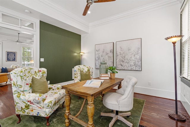 office area with a ceiling fan, baseboards, ornamental molding, and hardwood / wood-style flooring