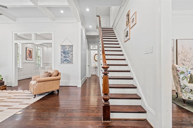 foyer featuring ornamental molding, stairs, wood finished floors, beamed ceiling, and coffered ceiling