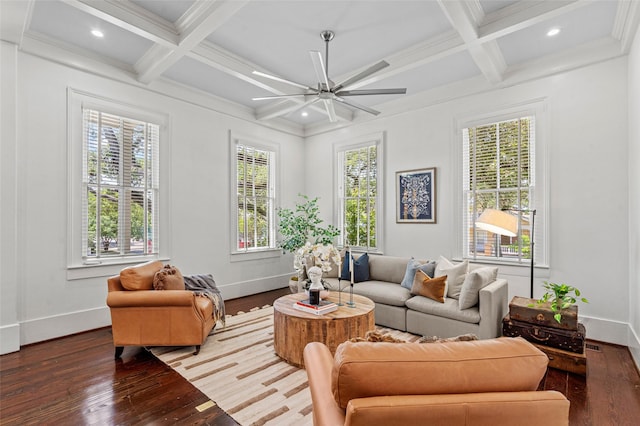 living area featuring a ceiling fan, baseboards, wood-type flooring, and coffered ceiling