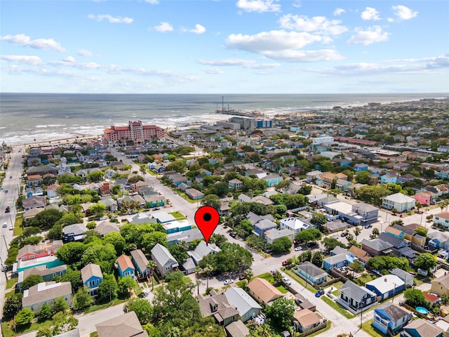 drone / aerial view featuring a water view and a residential view