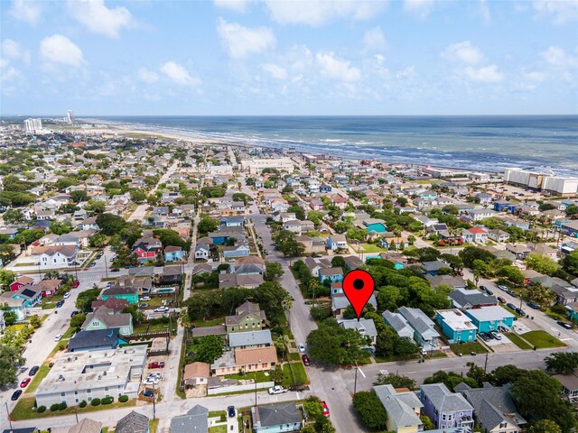 bird's eye view featuring a water view and a residential view