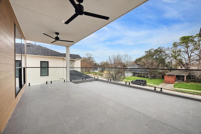 balcony featuring ceiling fan