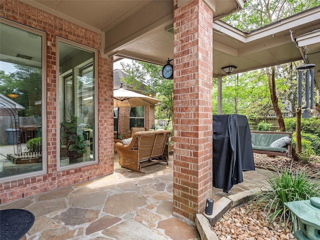 view of patio / terrace with fence and outdoor lounge area