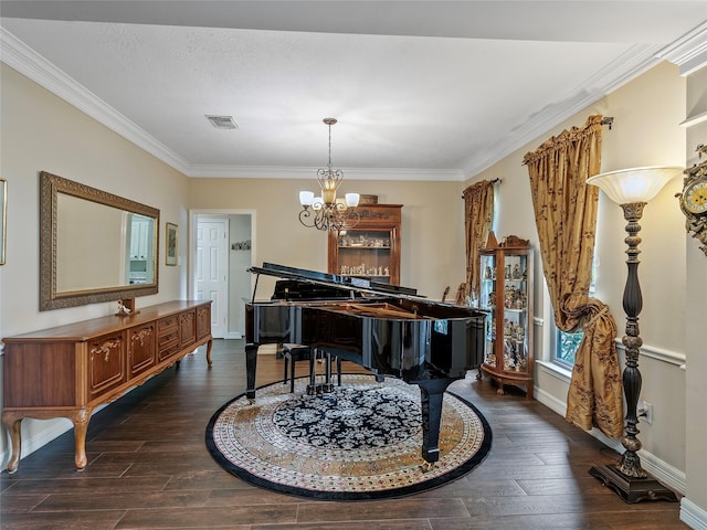 living area with baseboards, ornamental molding, dark wood finished floors, and a notable chandelier