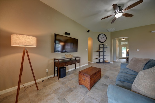 living room with arched walkways, baseboards, a ceiling fan, and visible vents
