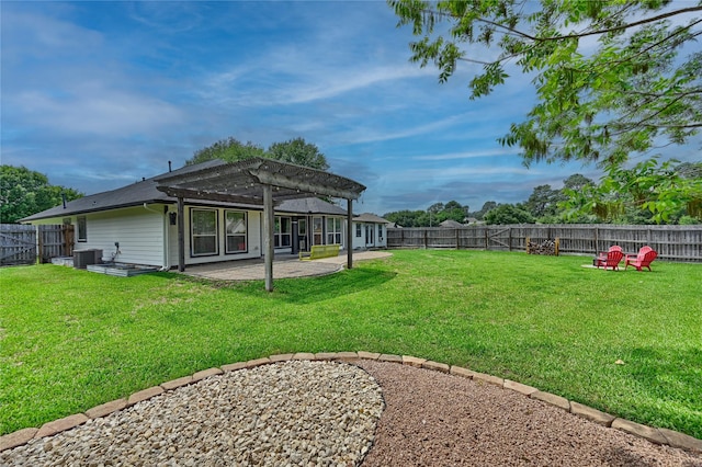 view of yard with a fenced backyard, a patio area, and a pergola