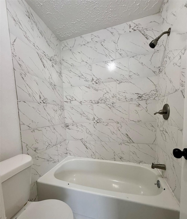 6410 Rancho Blanco Ct, Houston, TX 77083 - bathroom with toilet, a textured ceiling, and shower / bathtub combination