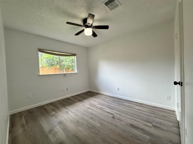 6410 Rancho Blanco Ct, Houston, TX 77083 - spare room featuring wood finished floors, a textured ceiling, ceiling fan, and baseboards