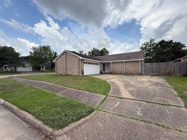 6410 Rancho Blanco Ct, Houston, TX 77083 - ranch-style home with driveway, an attached garage, and brick siding