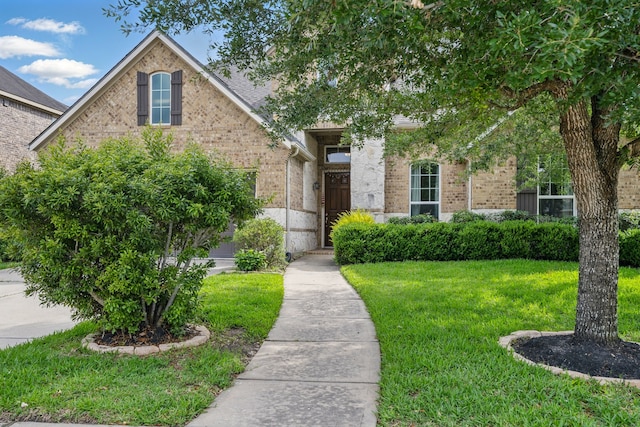 3422 Leaning Willow Dr, Katy, TX 77494 - view of front of property featuring a front lawn and brick siding
