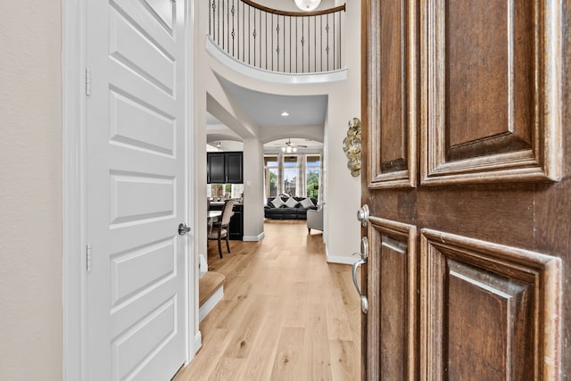 3422 Leaning Willow Dr, Katy, TX 77494 - entryway featuring baseboards and light wood-style flooring