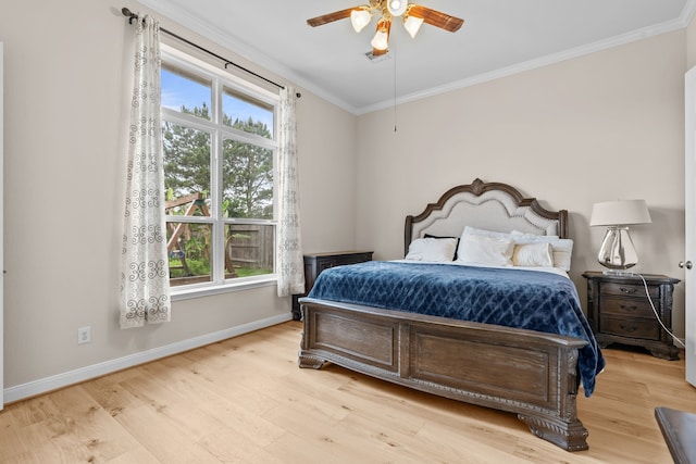 3422 Leaning Willow Dr, Katy, TX 77494 - bedroom featuring crown molding, baseboards, multiple windows, and wood finished floors