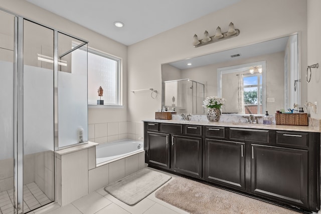 3422 Leaning Willow Dr, Katy, TX 77494 - bathroom with double vanity, a sink, a bath, and a stall shower