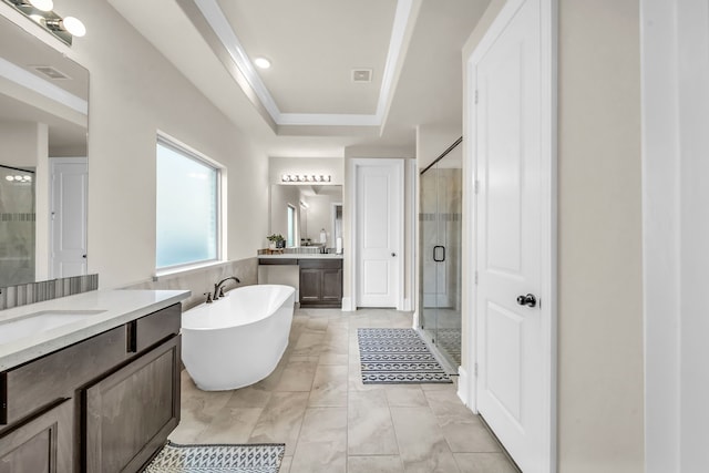 32927 Franklin Brooks Dr, Brookshire, TX 77423 - bathroom with visible vents, a sink, a freestanding bath, and a stall shower