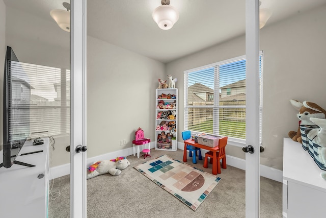 32927 Franklin Brooks Dr, Brookshire, TX 77423 - playroom with french doors, baseboards, and carpet flooring