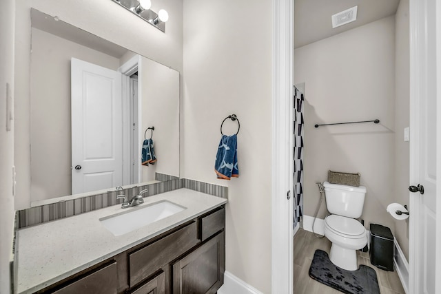 32927 Franklin Brooks Dr, Brookshire, TX 77423 - full bath with visible vents, vanity, a shower, toilet, and baseboards