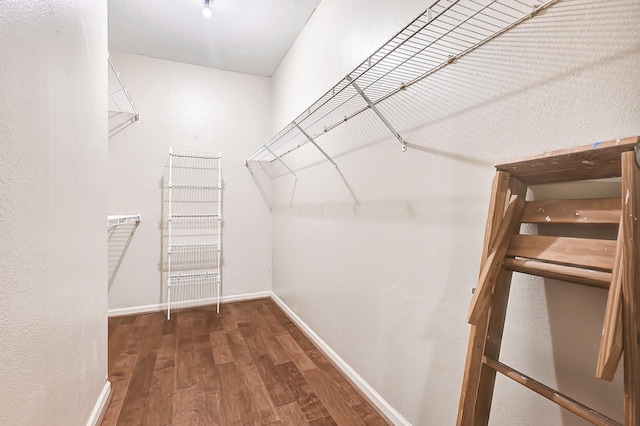 spacious closet with wood finished floors