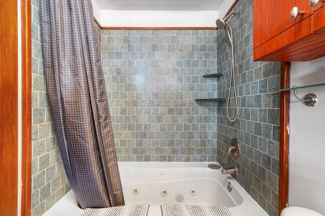 full bath with a combined bath / shower with jetted tub