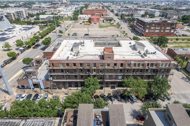 birds eye view of property featuring a city view