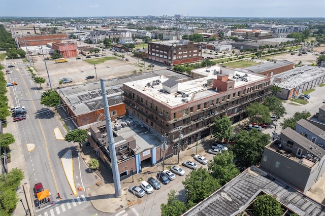 birds eye view of property featuring a city view