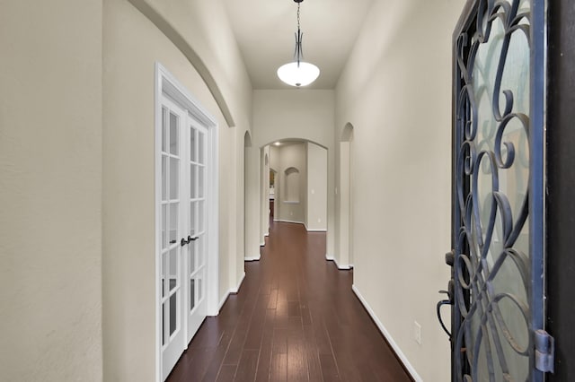 7610 Willow School Dr, Spring, TX 77389 - entrance foyer with french doors, arched walkways, dark wood-style flooring, and baseboards