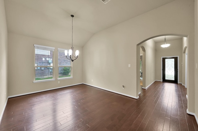 7610 Willow School Dr, Spring, TX 77389 - entrance foyer featuring arched walkways, baseboards, vaulted ceiling, and dark wood-style floors