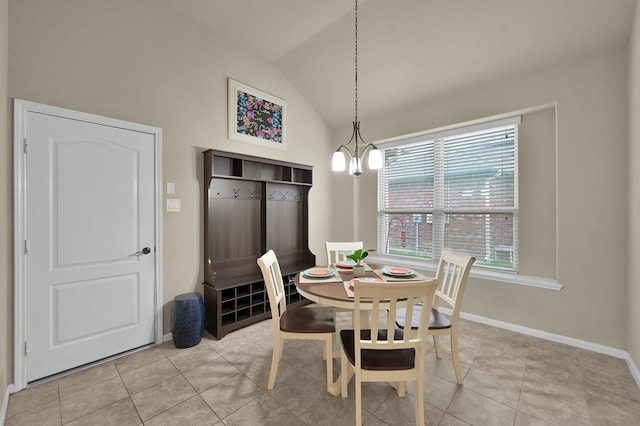 7610 Willow School Dr, Spring, TX 77389 - dining room featuring light tile patterned floors, baseboards, and vaulted ceiling