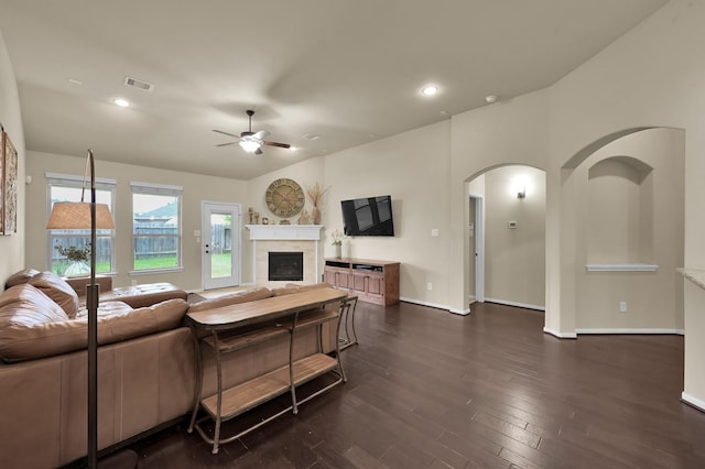 7610 Willow School Dr, Spring, TX 77389 - living room with a ceiling fan, visible vents, a tiled fireplace, and dark wood finished floors