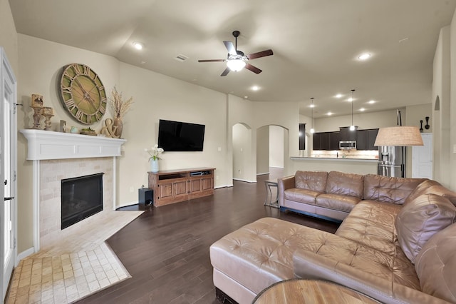 7610 Willow School Dr, Spring, TX 77389 - living area with visible vents, recessed lighting, a tile fireplace, a ceiling fan, and dark wood finished floors