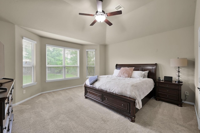 7610 Willow School Dr, Spring, TX 77389 - bedroom with ceiling fan, visible vents, light colored carpet, vaulted ceiling, and baseboards