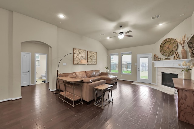 7610 Willow School Dr, Spring, TX 77389 - living area with arched walkways, ceiling fan, dark wood-style floors, and visible vents