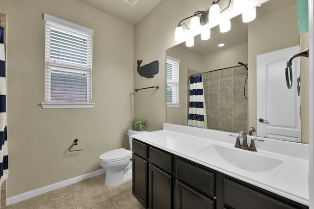 7610 Willow School Dr, Spring, TX 77389 - bathroom featuring baseboards, tile patterned floors, curtained shower, and a healthy amount of sunlight