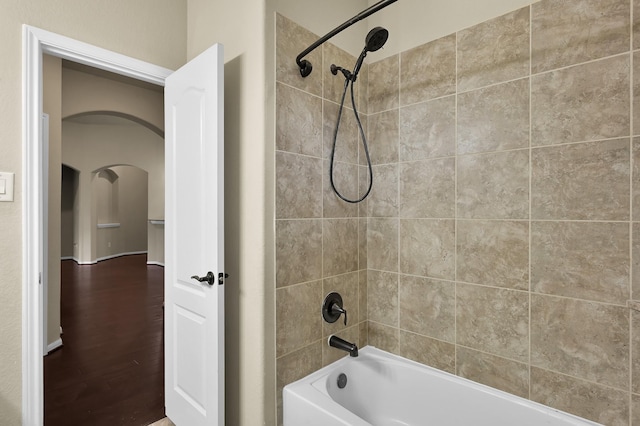 7610 Willow School Dr, Spring, TX 77389 - full bathroom featuring shower / bath combination and wood finished floors